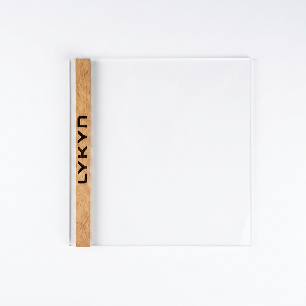 Lykyn sliding glass door with its solid walnut handle, laser engraved with the LYKYN wordmark that you can replace with your own custom text