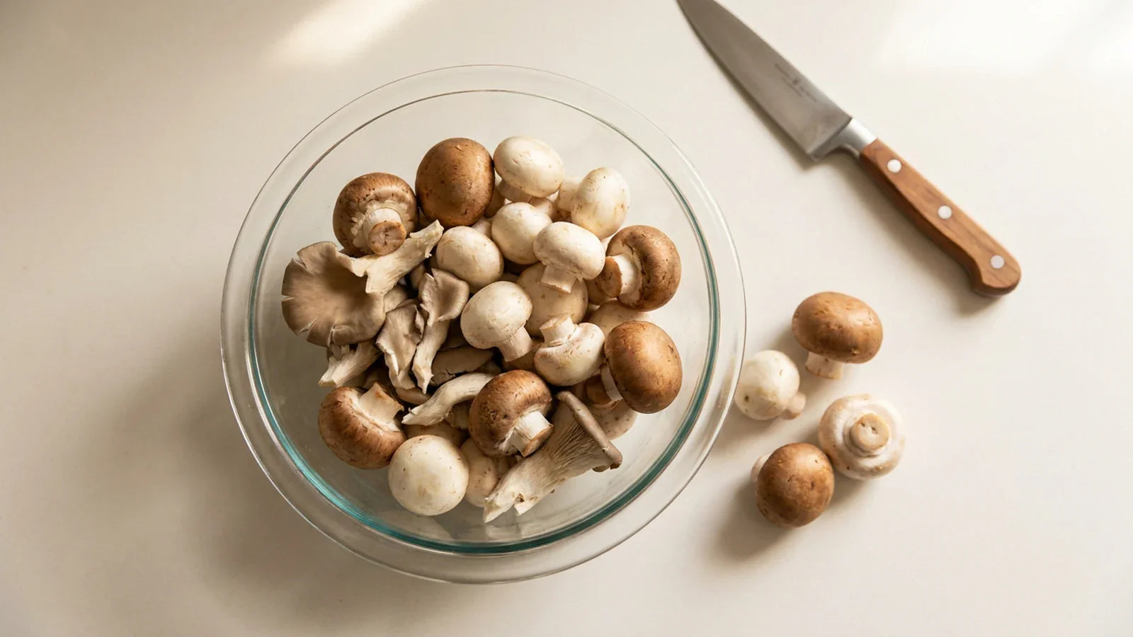 Fresh mushrooms in a glass bowl prepared for freezing storage at home