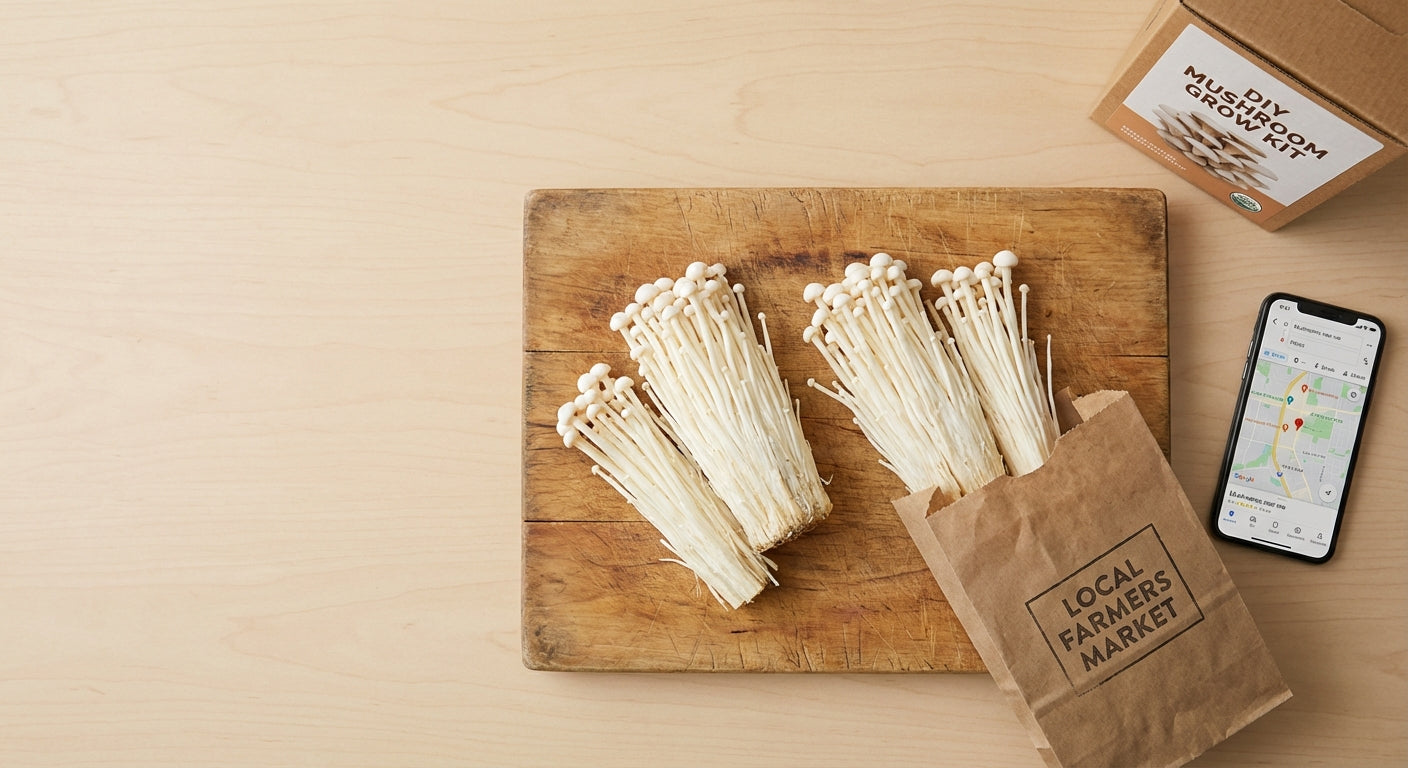 Fresh white enoki mushrooms displayed on wooden cutting board with local market bag and smartphone showing nearby store search results, representing multiple ways to source enoki mushrooms locally