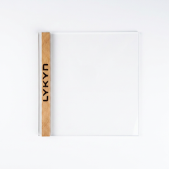 Lykyn sliding glass door with its solid walnut handle, laser engraved with the LYKYN wordmark that you can replace with your own custom text